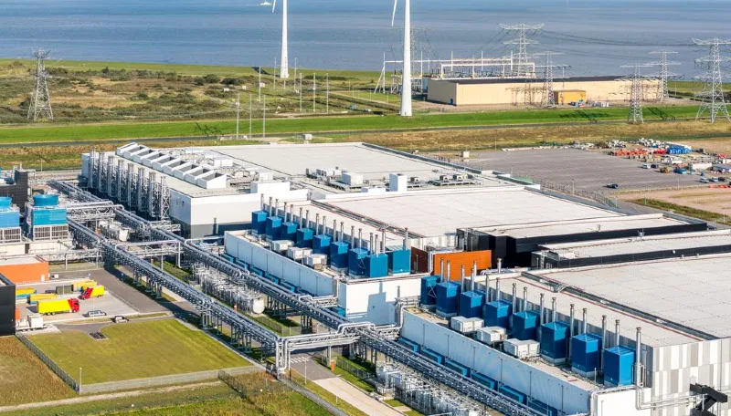 Modern equipped data center with server racks, cabling, and advanced cooling system.